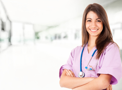 Young nurse smiling in an hospital